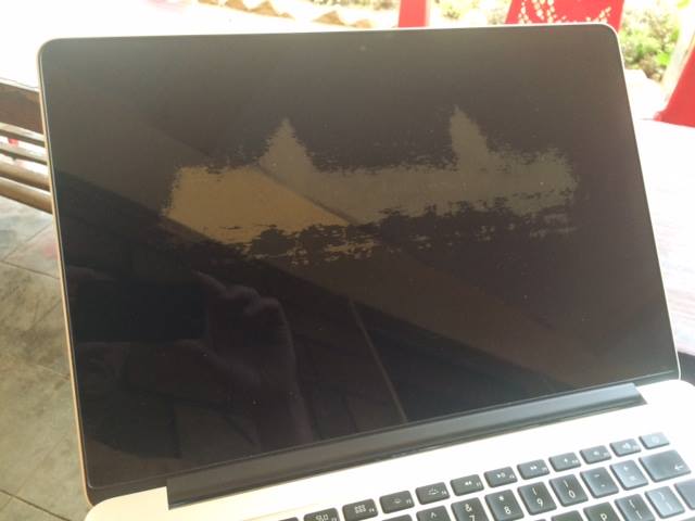 Macbook with Stain from Joakim Larsen
